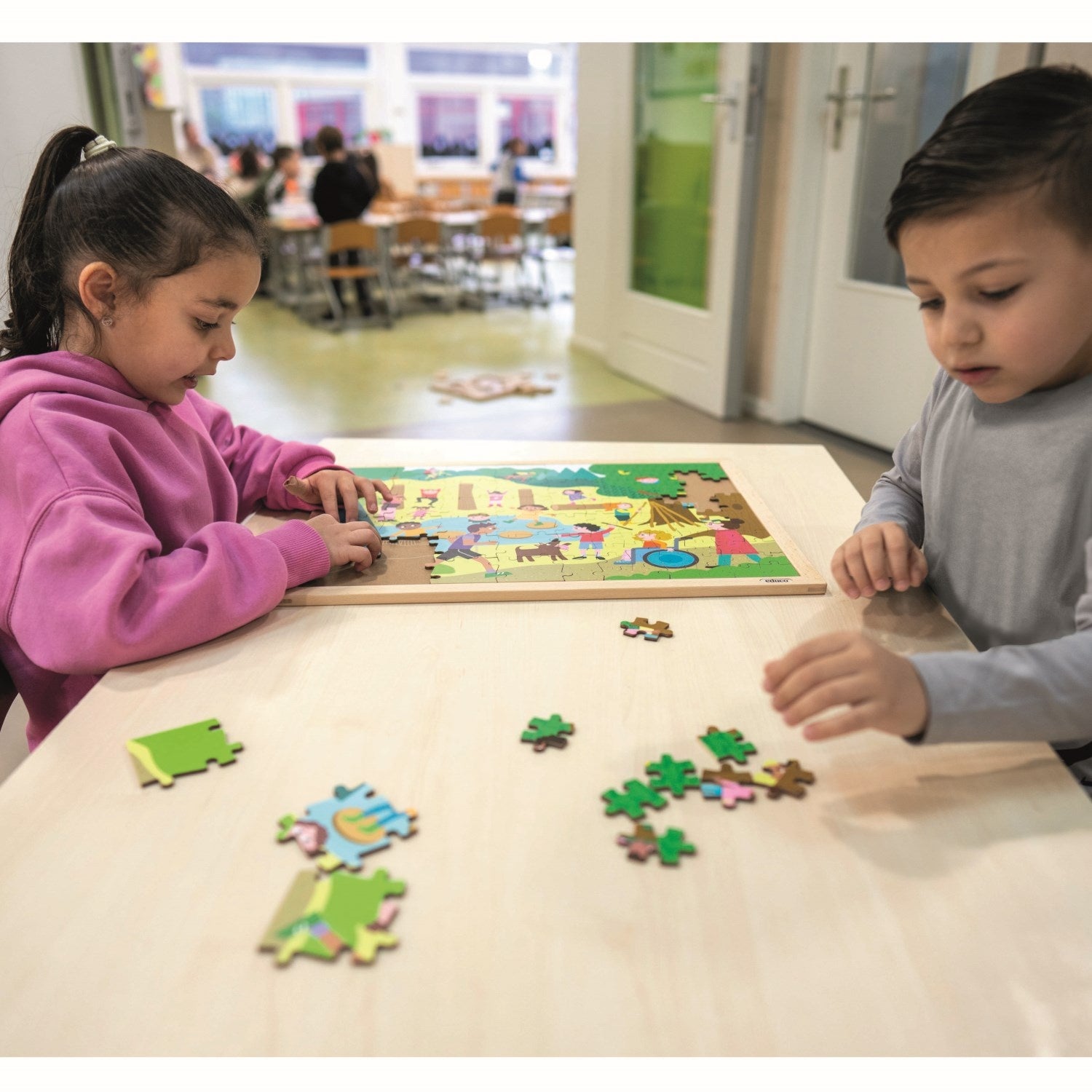 Puzzle cooperativo - Nel parco giochi della scuola